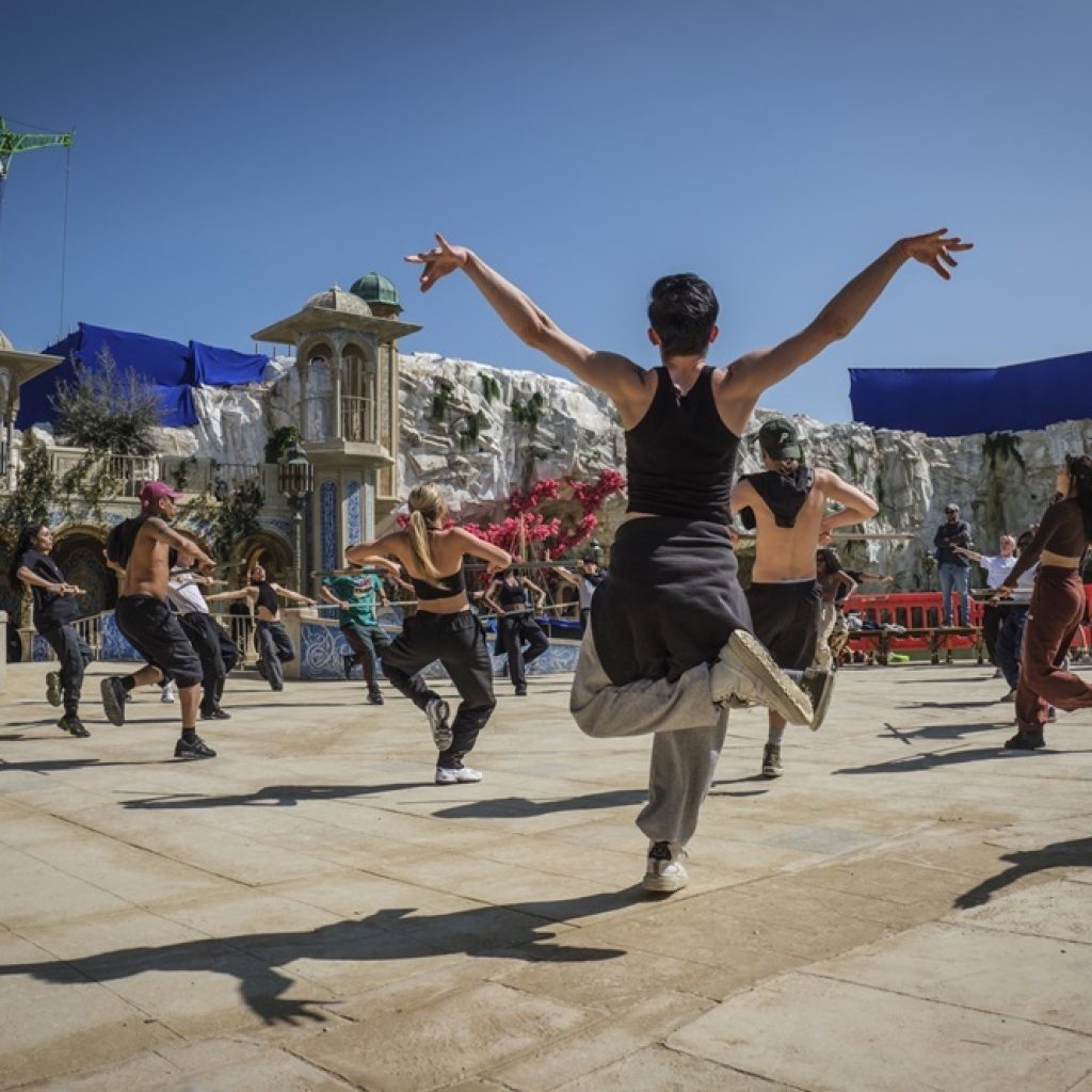 Dancers on 'Wicked' set. Photo by Giles Keyte, Universal Pictures.